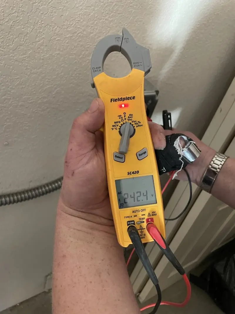 Voltage testing with clamp meter during Generator Installation in Ossian